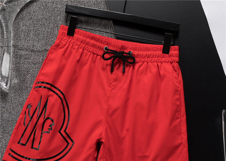 M*NCLR Embroidered Patched Logo Swim Shorts